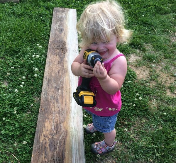 Toddler Playing with Drill | 70+ Practical Homesteading Essentials You Need for Self-Sufficiency | Faithful Farmwife