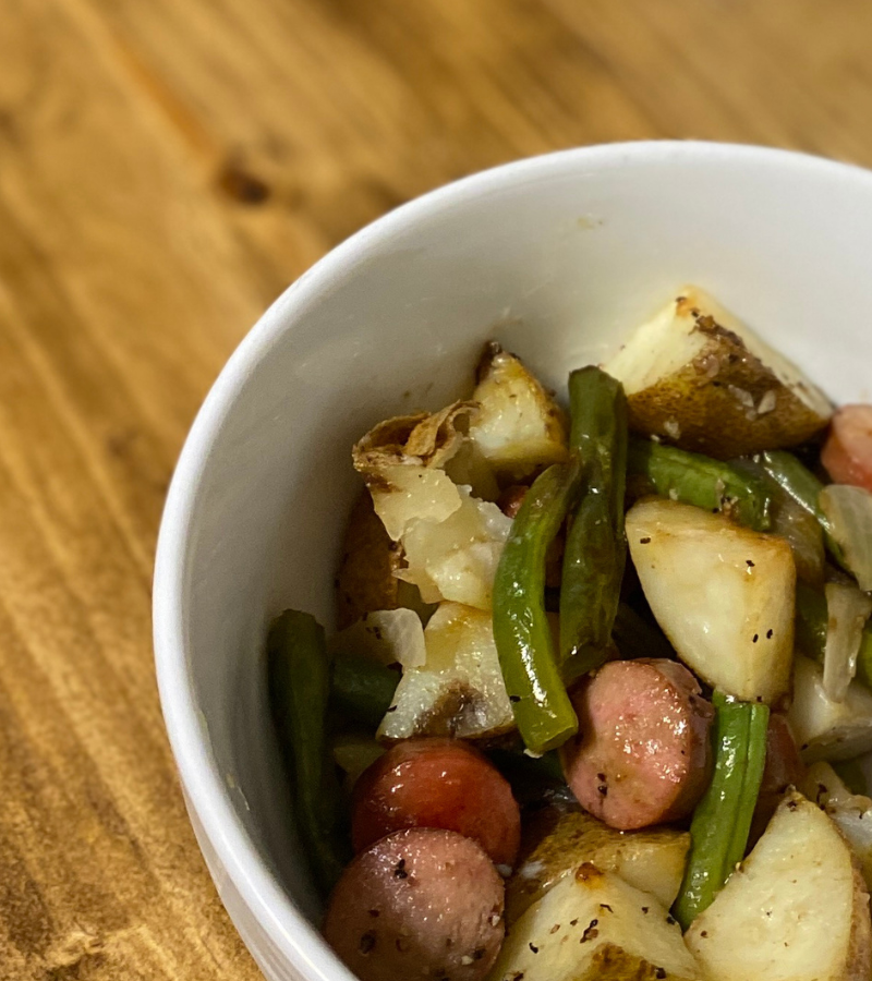 Poor Man's Meal in White bowl- hot dogs, potatoes, and green beans